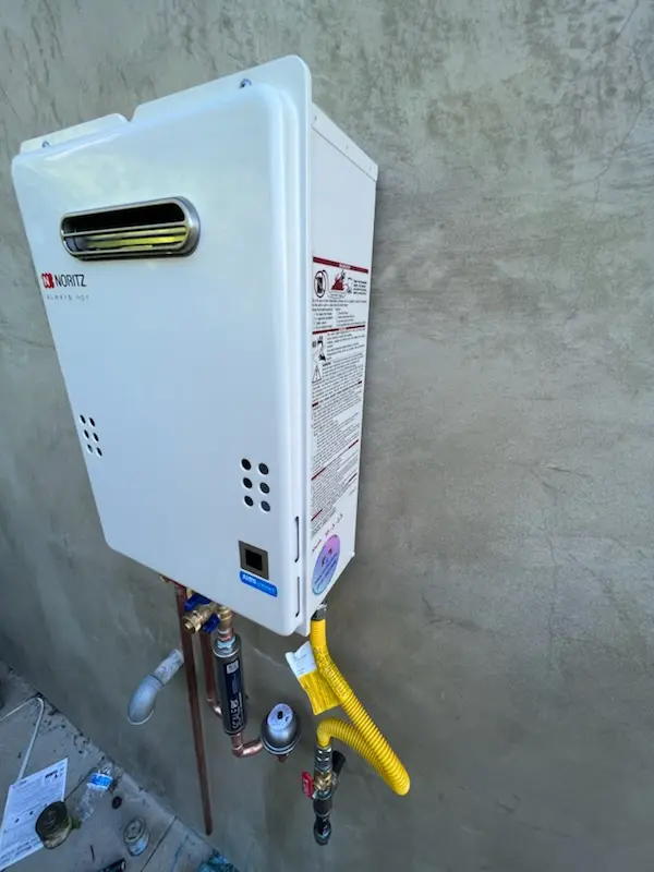Tankless water heater installation for Owen Brown homes